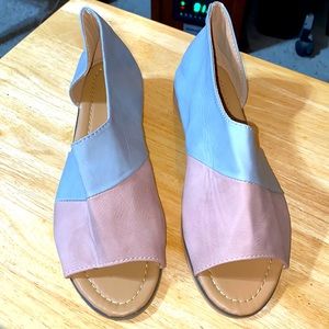 Never used sandals. Size 7.5